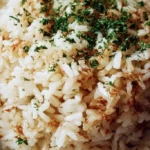 Garlic Parmesan Rice Recipe 3 garlic parmesan rice recipe 2026 01 19 153128 683x1024 1