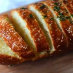 Copycat Raising Cane’s Garlic Bread 3 copycat raising canes garlic bread 2026 02 14 133638 683x1024 1
