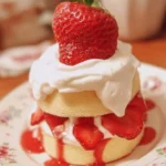Delicious strawberry shortcake with juicy strawberries and whipped cream topping